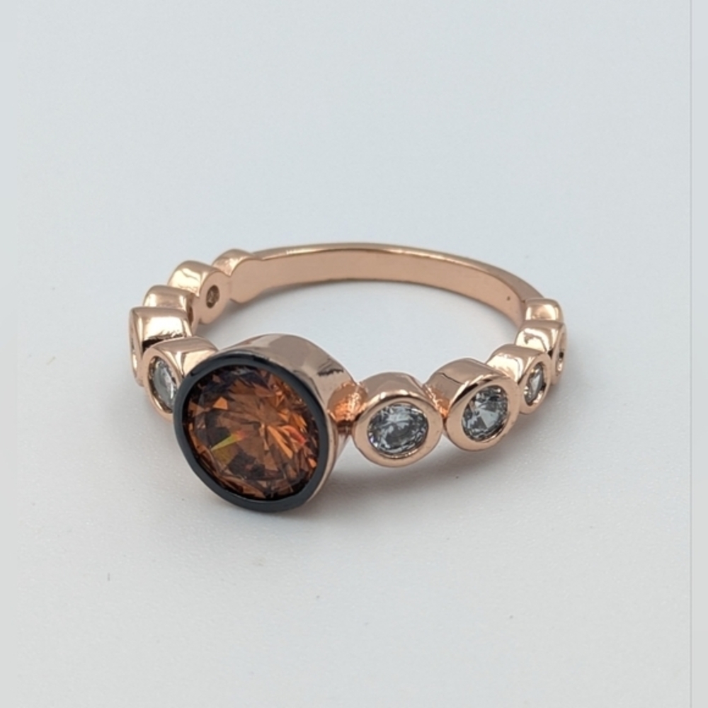 5/25$  Rose gold tone and rhinestone costume ring